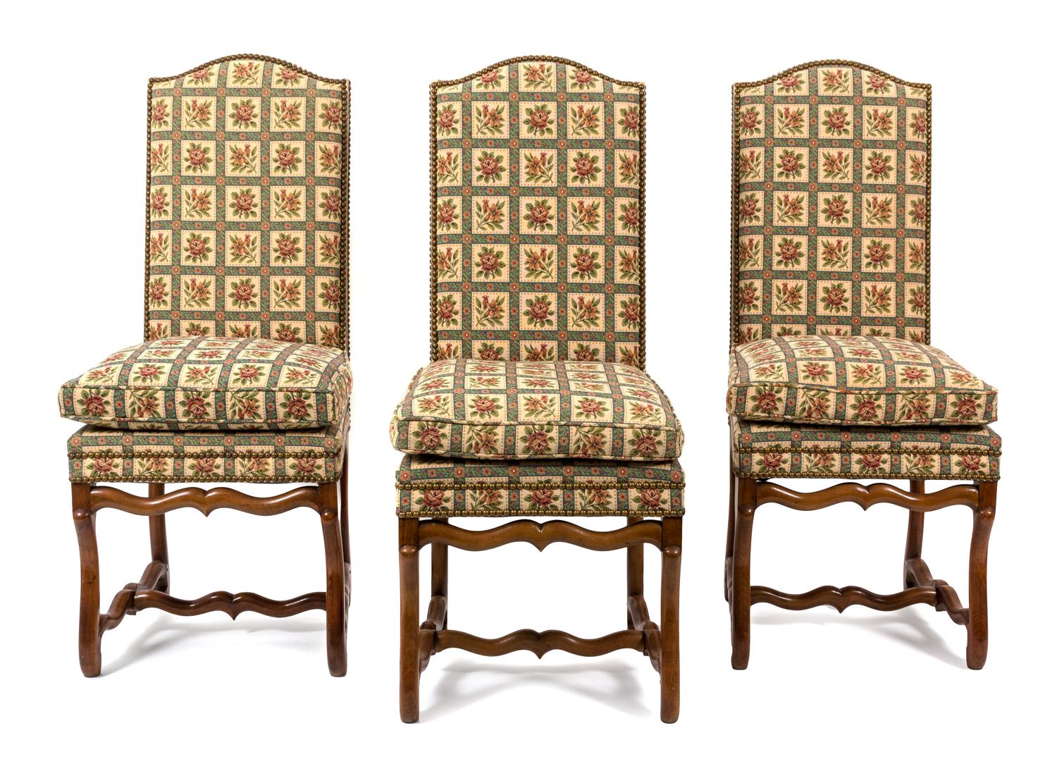 A Set of Eight Italian Walnut Dining Chairs Height 43 x width 19 x depth 21 inches. — 20TH CENTURY