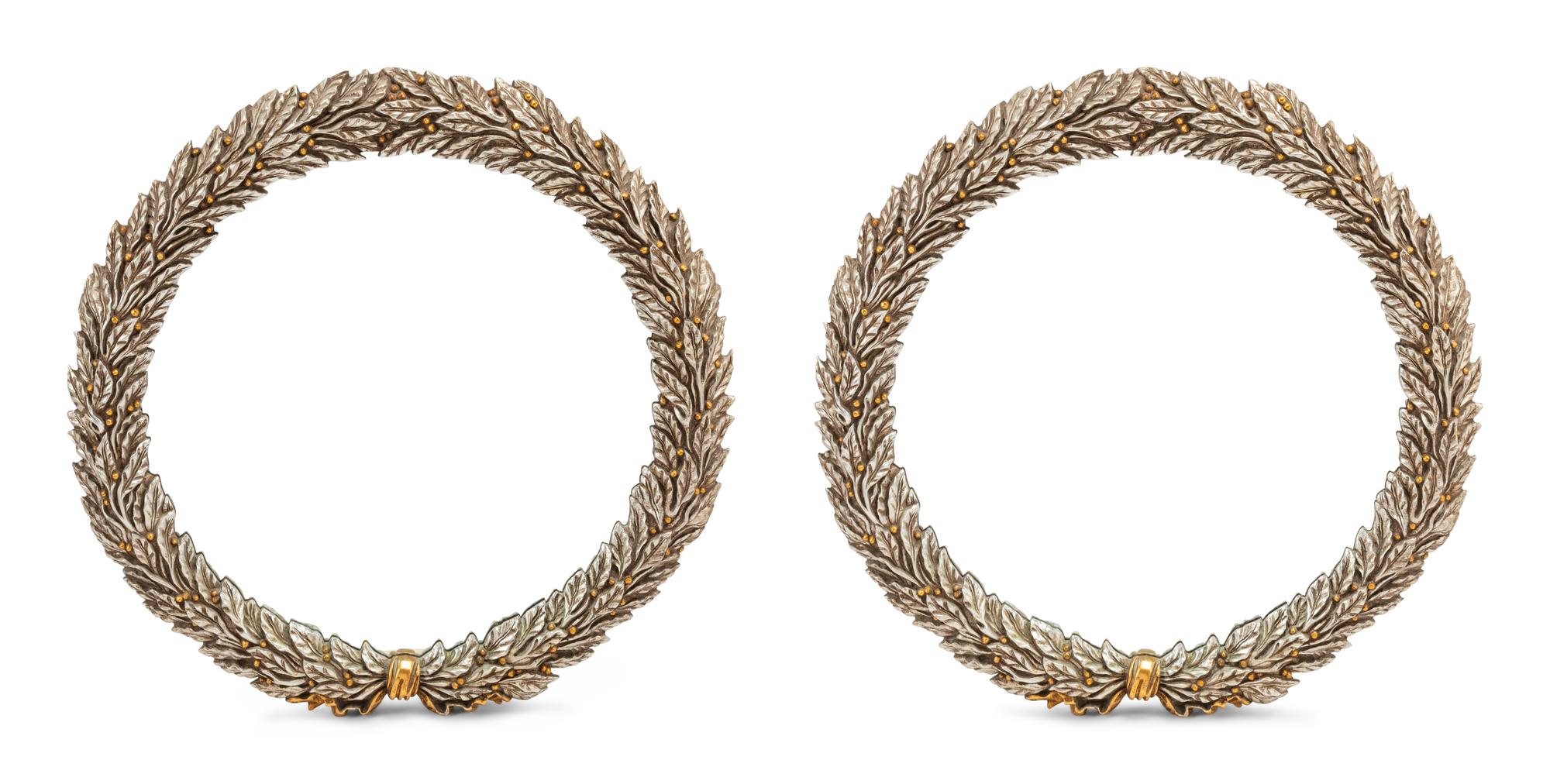 A Pair of Carved, Gilt and Silvered Wood Laurel Wreath Mirrors