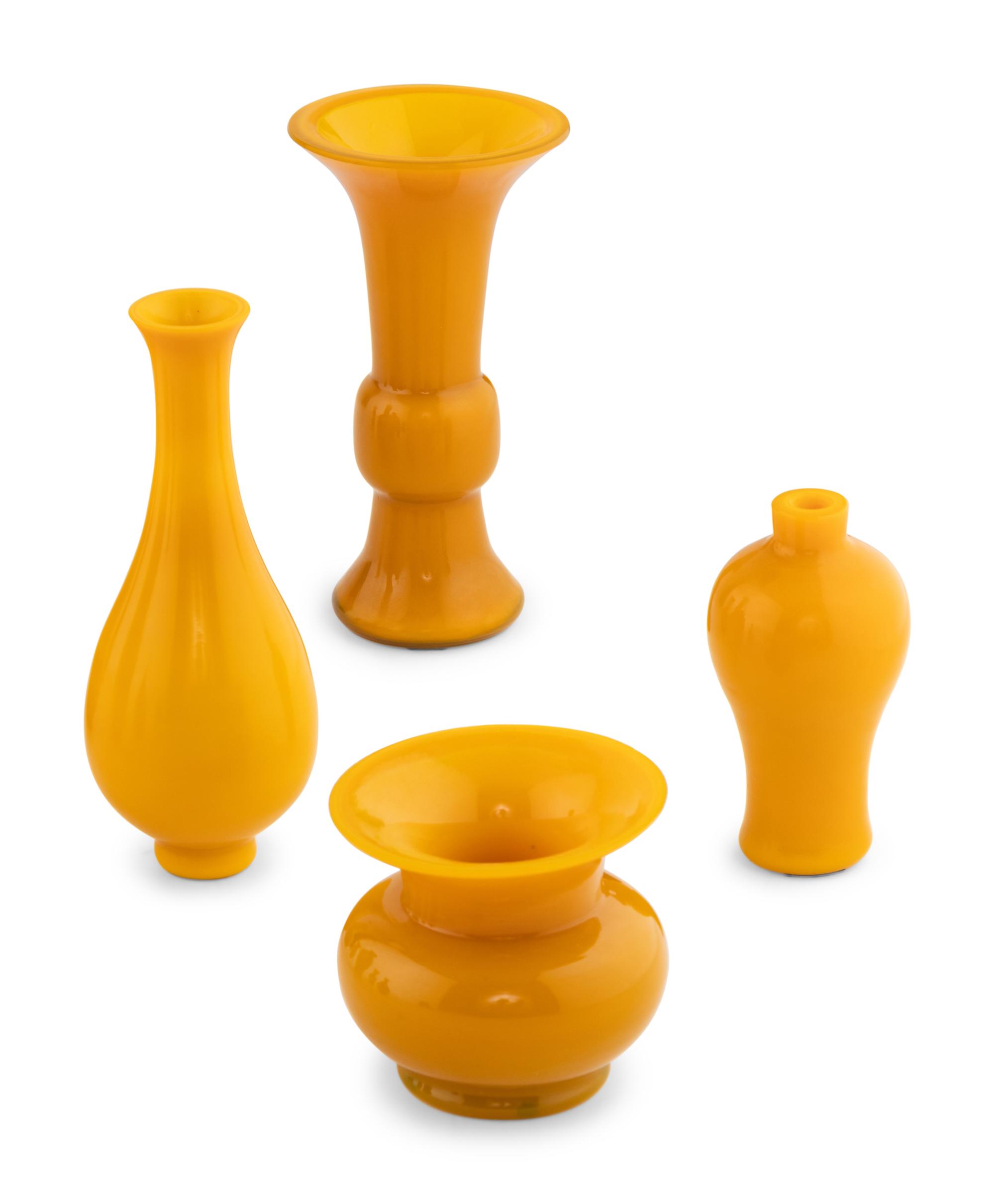 A Collection of Nine Yellow Peking Glass Vessels