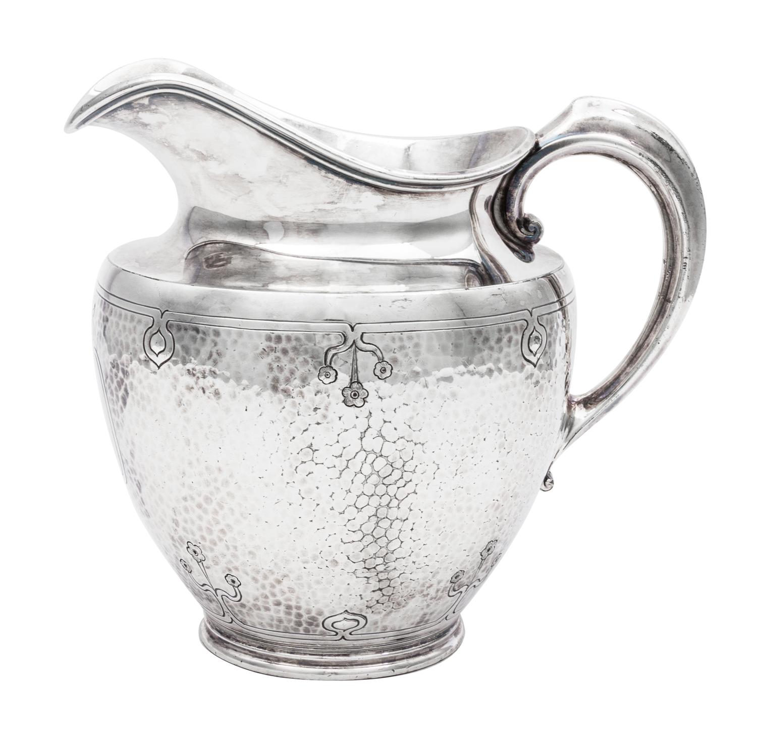 An American Arts and Crafts Silver-Plate Water Pitcher, Reed & Barton, Taunton, MA, having a spot-hammered body decorated with incised