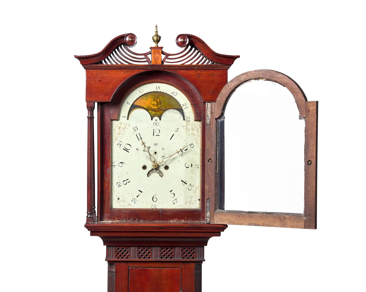 A Federal Carved And Inlaid Walnut and Cherrywood Tall Case Clock
