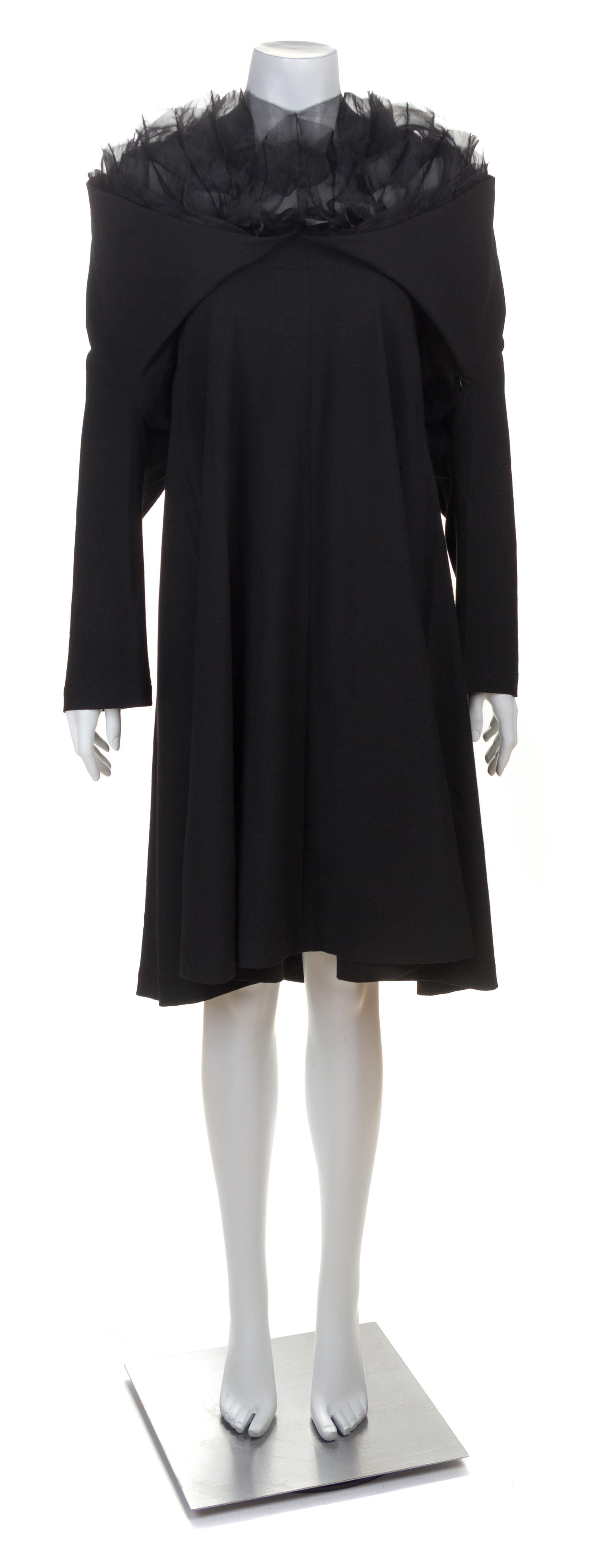 A Junya Wantanabe Black Dress, Size medium.