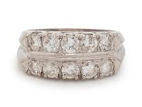 A 14 Karat White Gold and Diamond Ring,