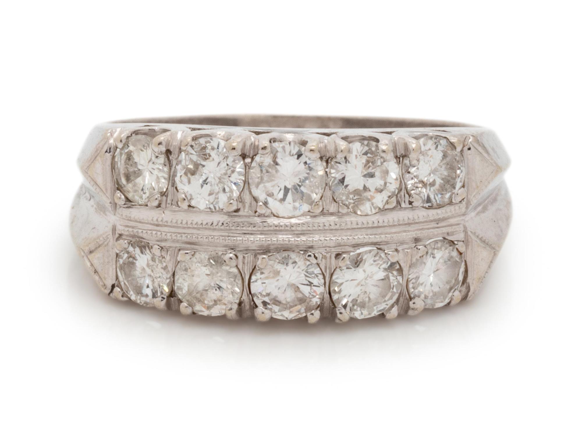 A 14 Karat White Gold and Diamond Ring,