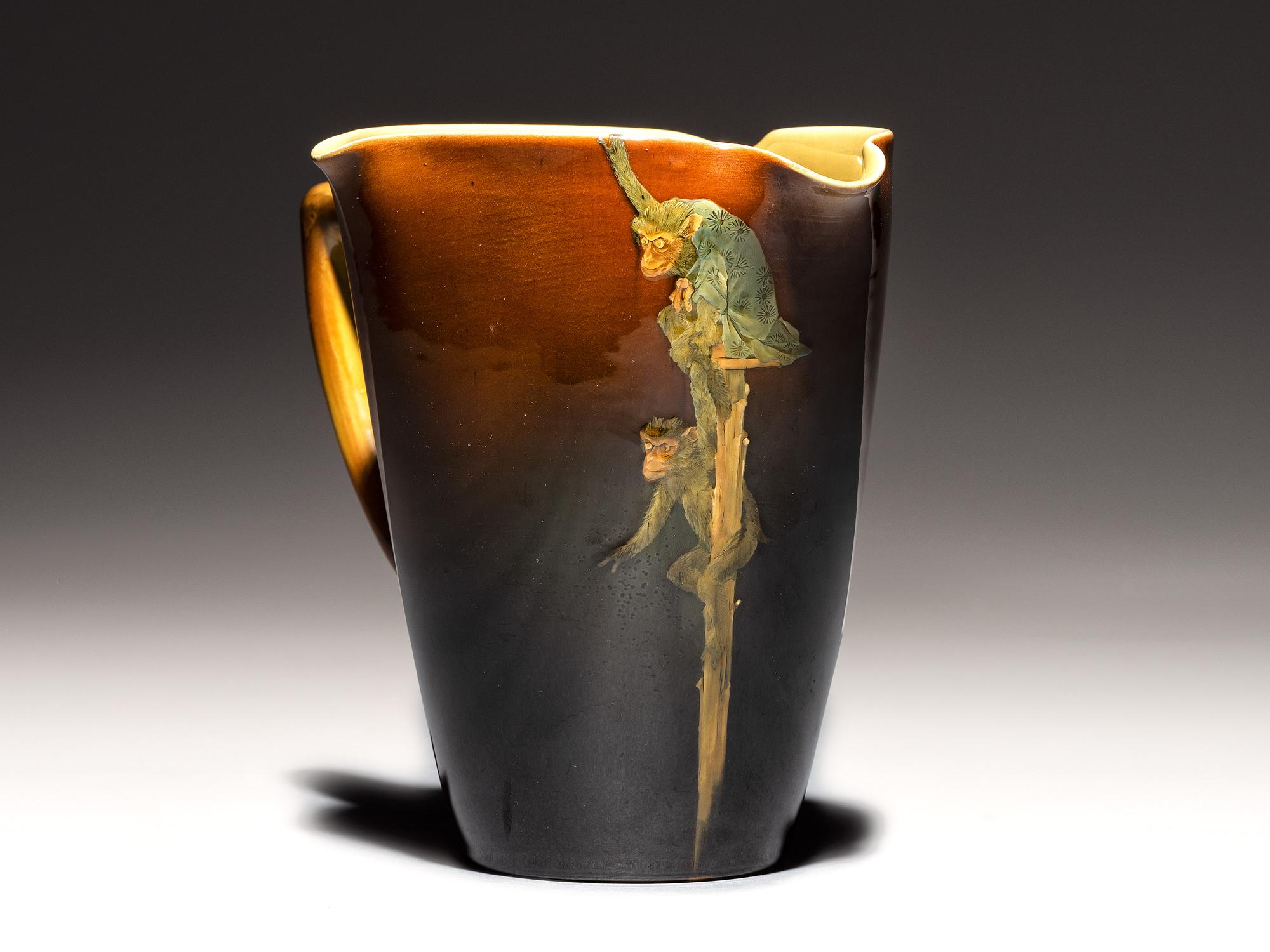 Standard Glaze Tri-Corner Pitcher with Monkey Decoration, 1889