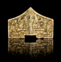 A Chinese Chicken-Bone Jade Sword Fitting MING DYNASTY OR EARLIER Width 2 1/8 inches. — MING DYNASTY OR EARLIER