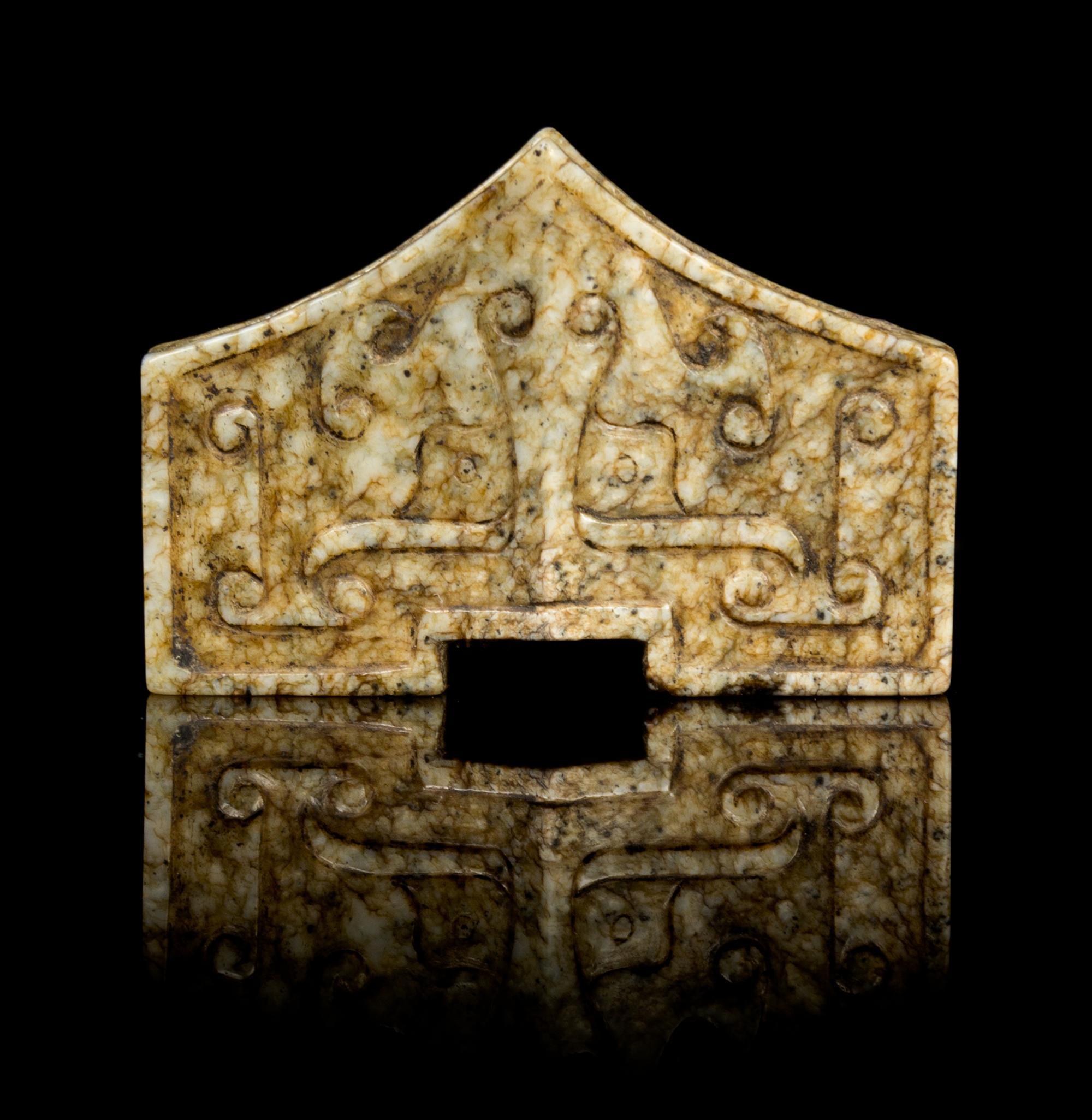 A Chinese Chicken-Bone Jade Sword Fitting MING DYNASTY OR EARLIER Width 2 1/8 inches. — MING DYNASTY OR EARLIER