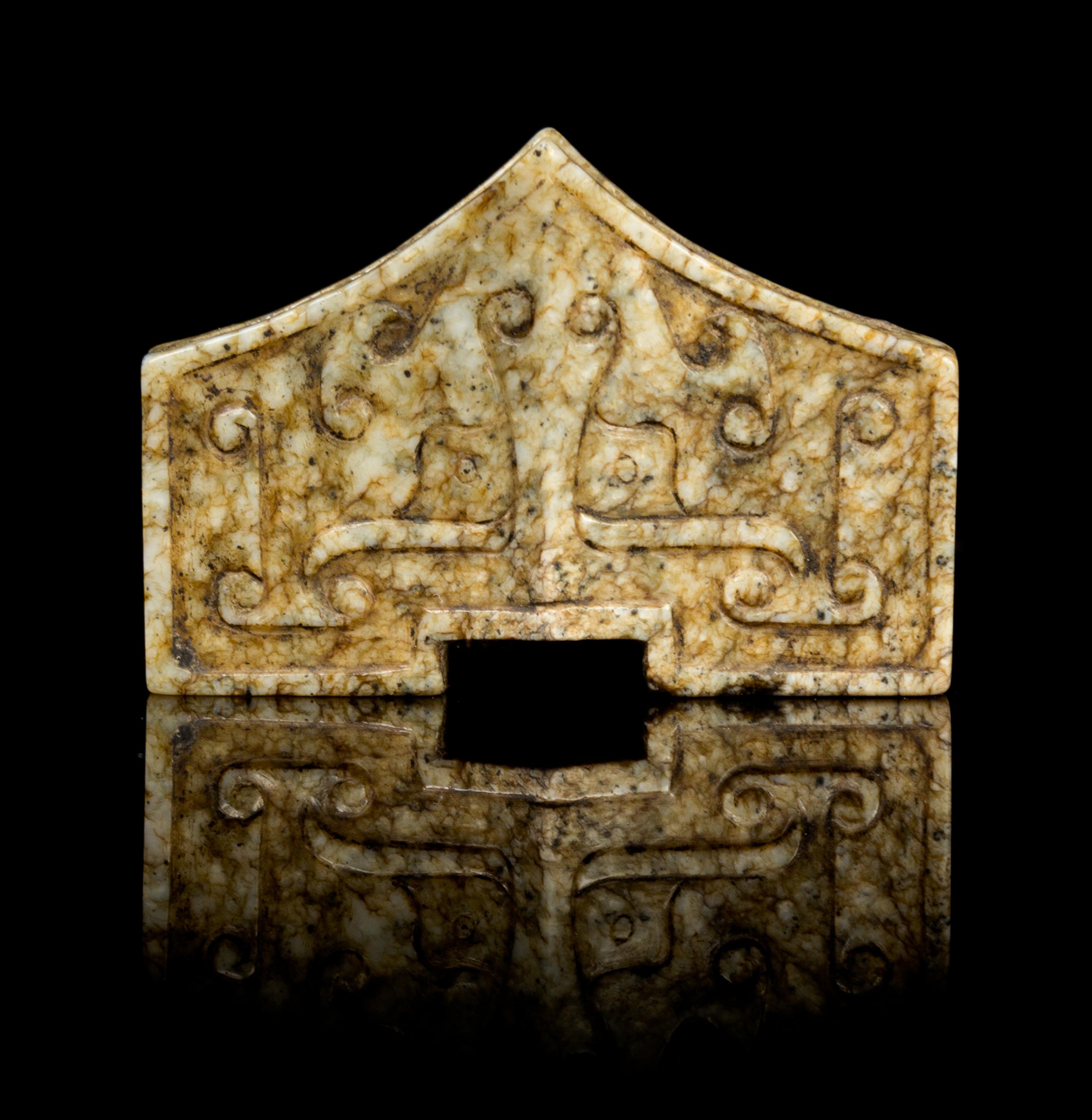 A Chinese Chicken-Bone Jade Sword Fitting MING DYNASTY OR EARLIER Width 2 1/8 inches. — MING DYNASTY OR EARLIER