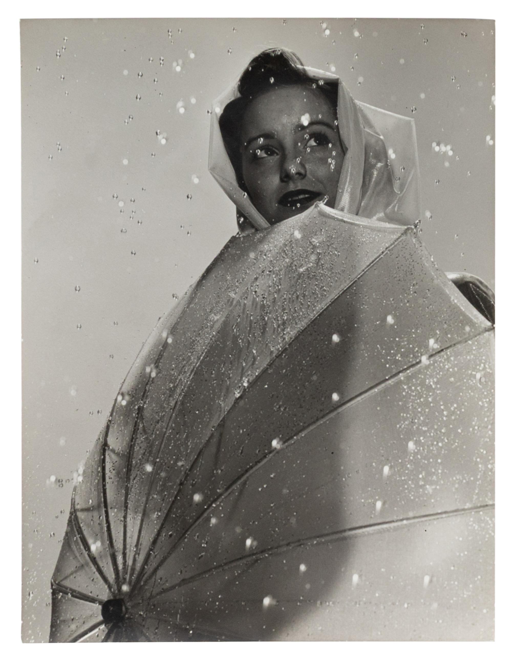 A Group of Four Works depicting models in the rain for Vogue, Glamour, and Life Magazines, 1941-45