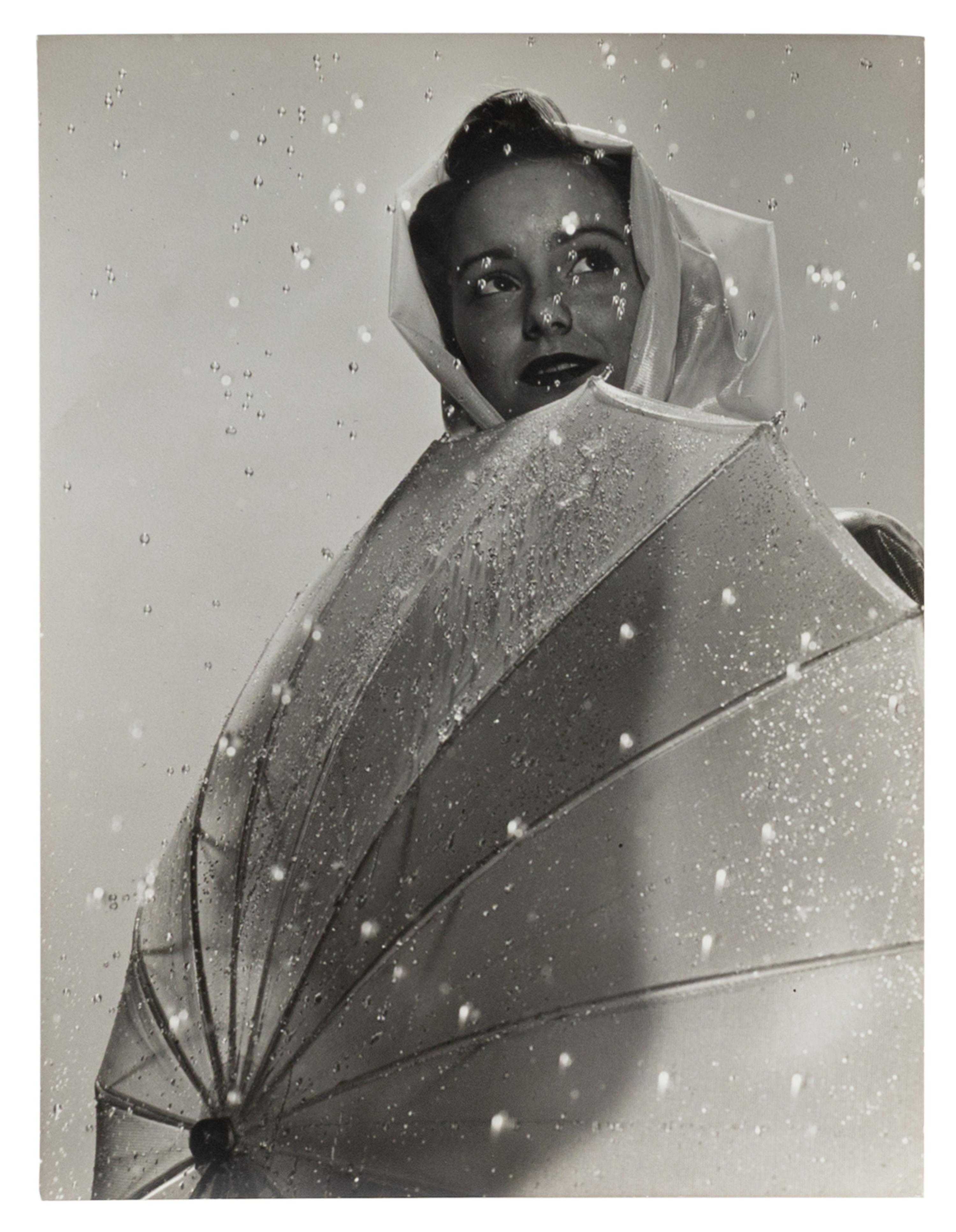 A Group of Four Works depicting models in the rain for Vogue, Glamour, and Life Magazines, 1941-45