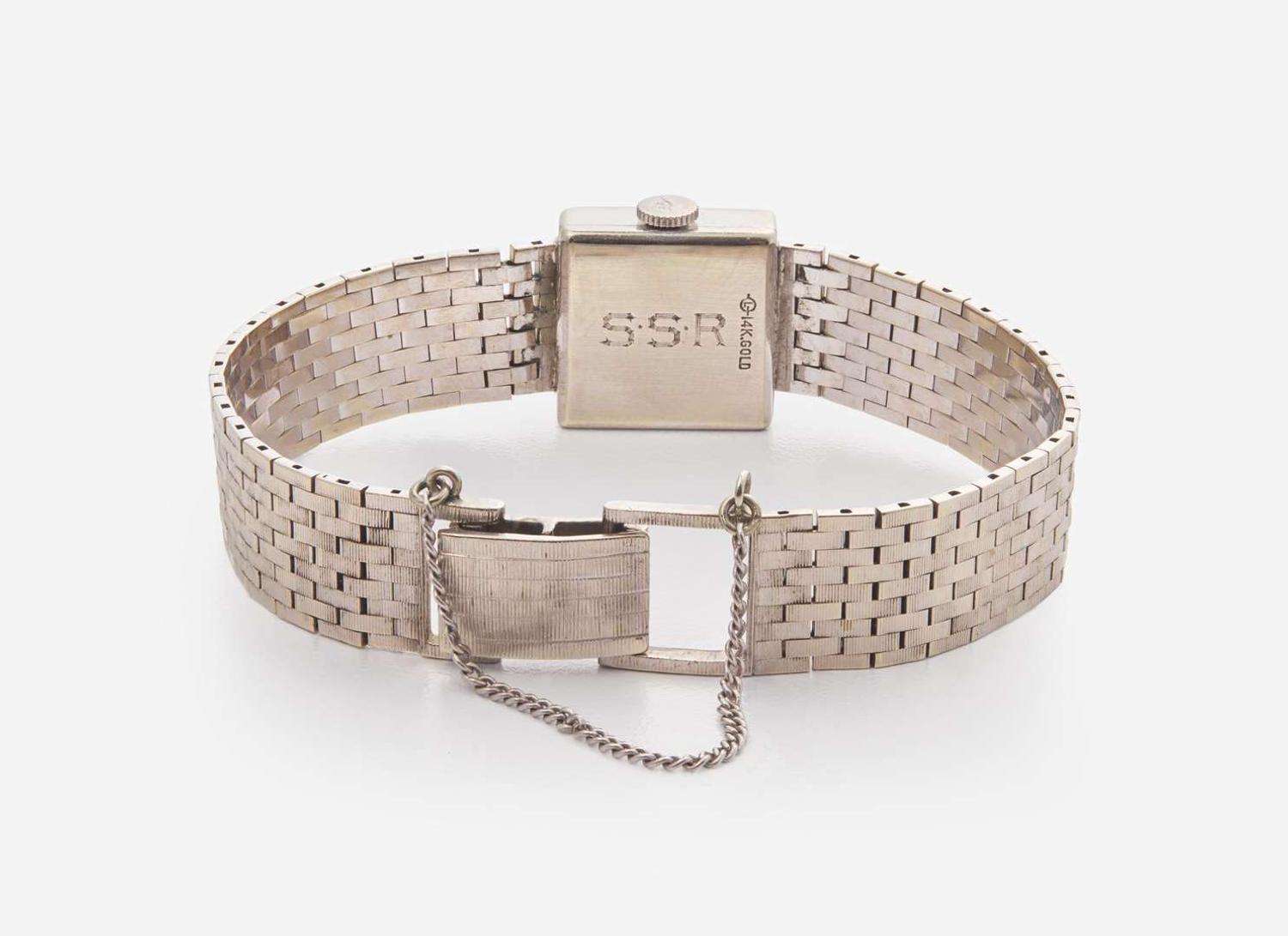 A Ladies 14K White Gold Movado Watch with Diamonds