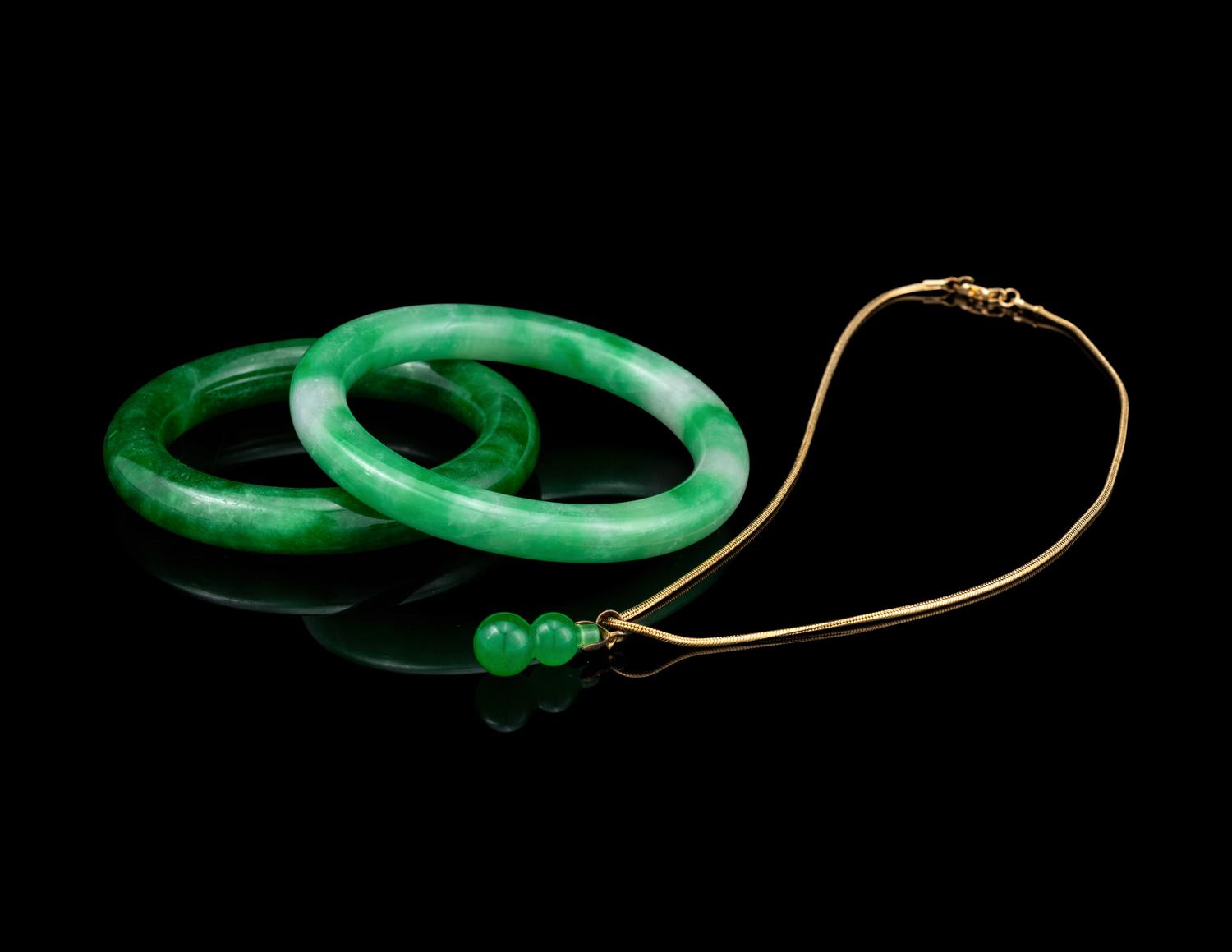 Two Chinese Jadeite Bangles and A Jadeite Gourd-Form Pendant