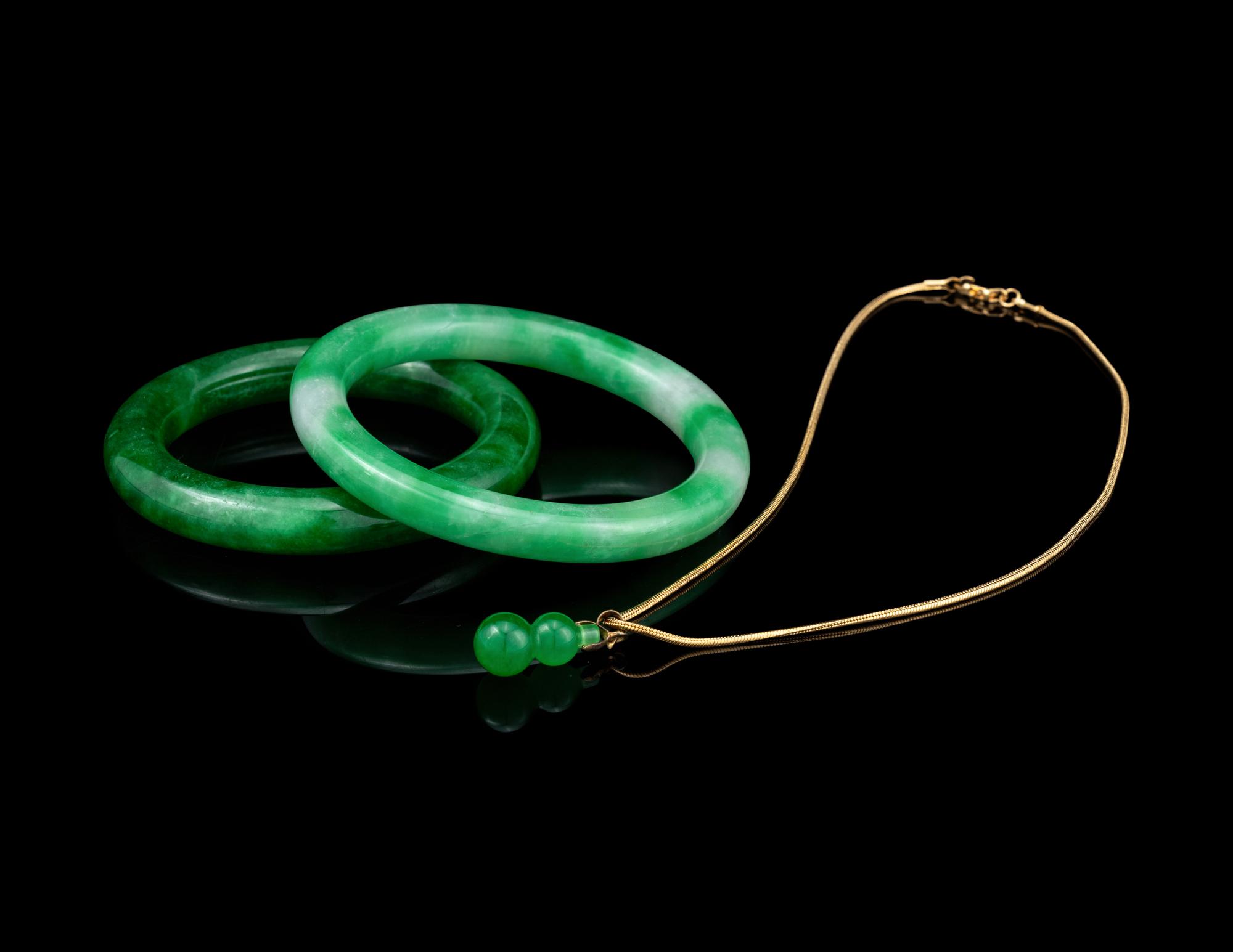 Two Chinese Jadeite Bangles and A Jadeite Gourd-Form Pendant