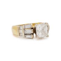 PRINCESS CUT DIAMOND AND YELLOW GOLD RING