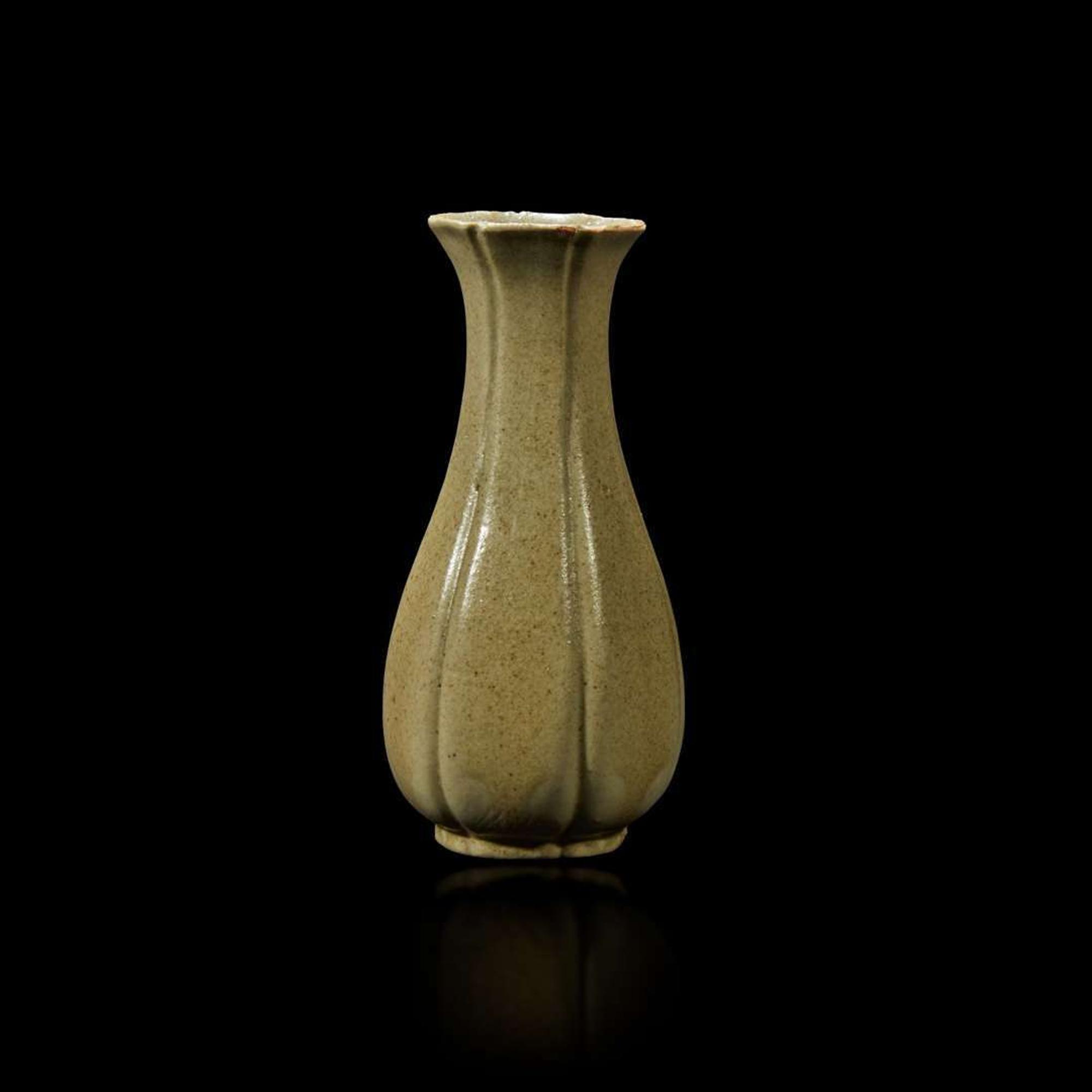 A Chinese grey-green-glazed lobed miniature vase Qing Dynasty, possibly 18th Century
