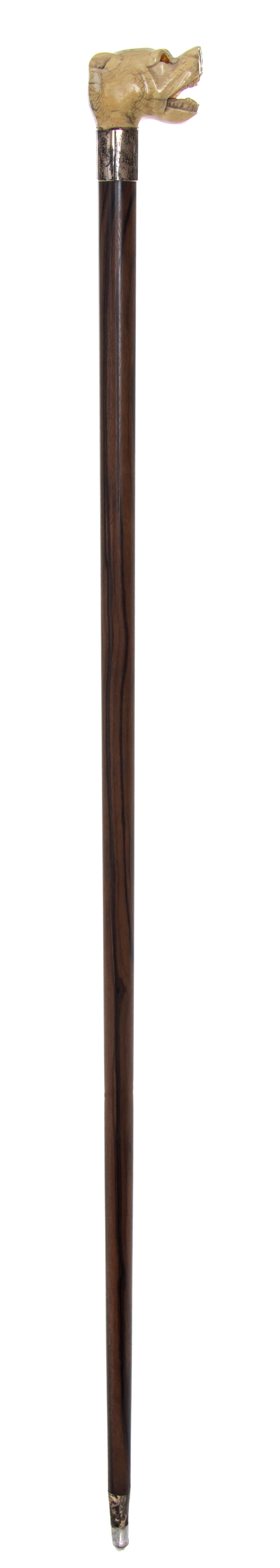 An American Ivory Handled Cane, Width of handle 2 1/2 x length overall 35 3/4 inches.