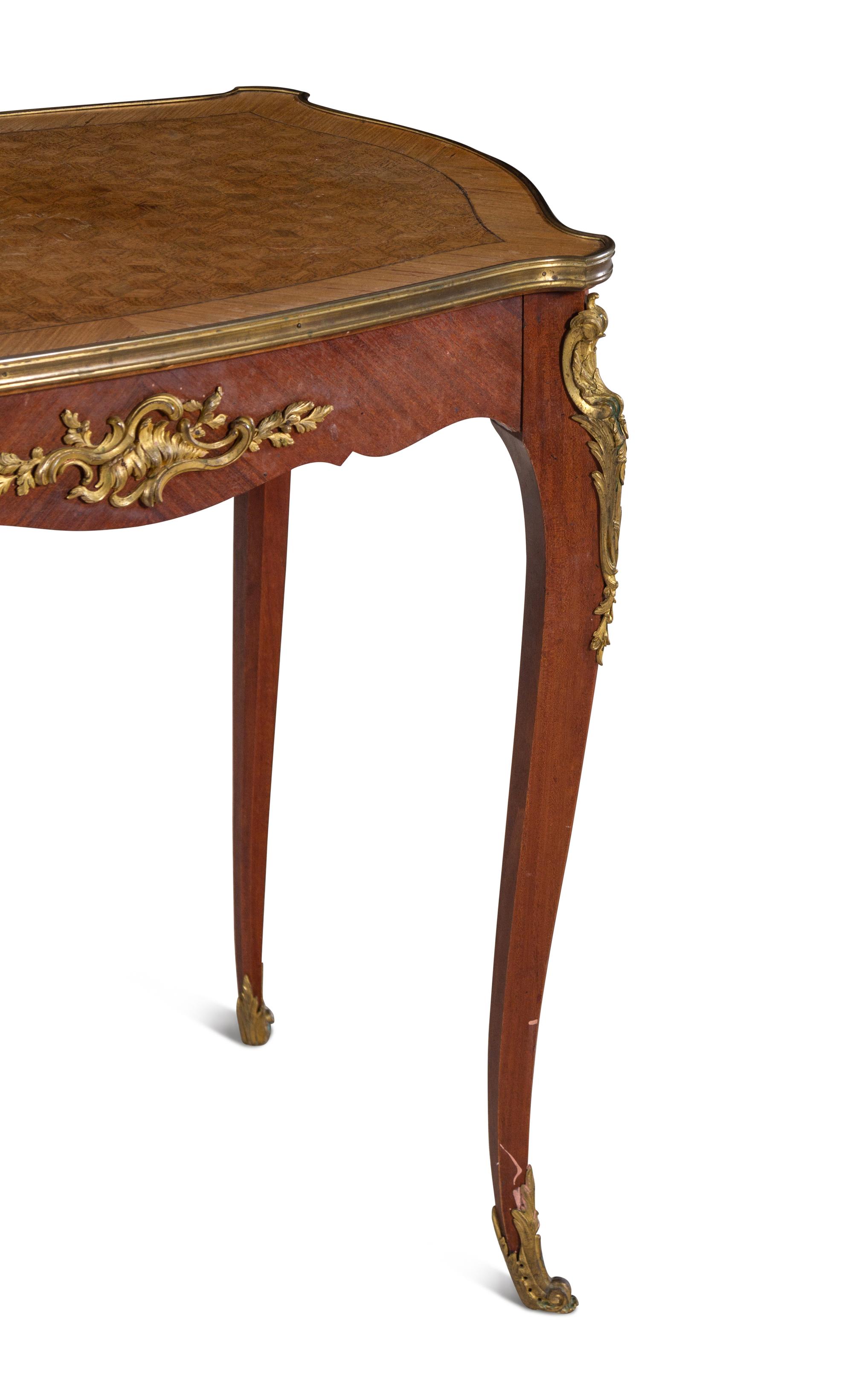 A Louis XV Style Gilt Bronze Mounted Parquetry Table