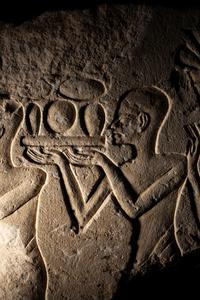 An Egyptian Limestone Relief Fragment
