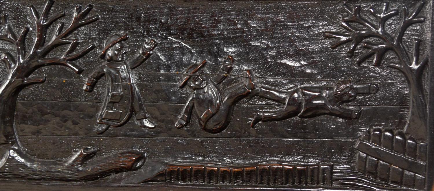 A William and Mary Style Carved Oak Settle