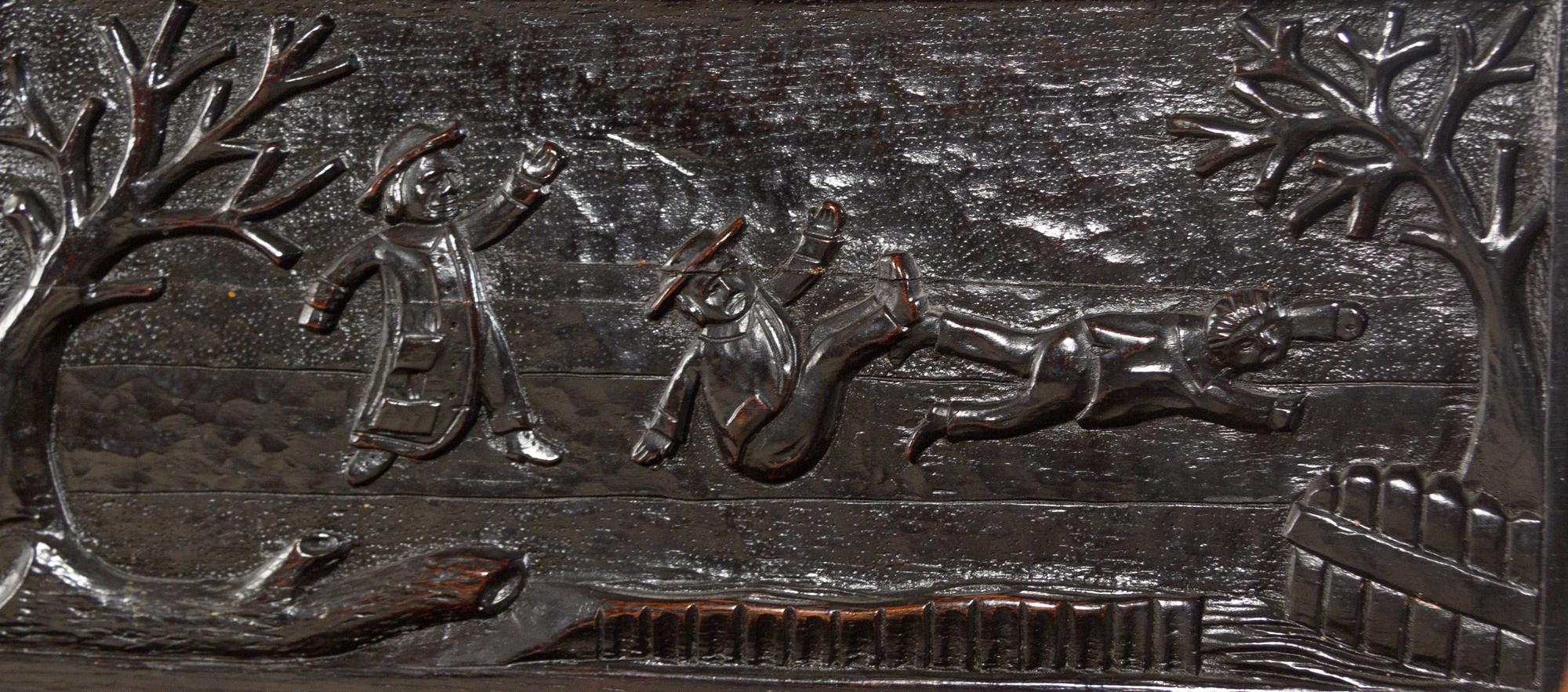 A William and Mary Style Carved Oak Settle