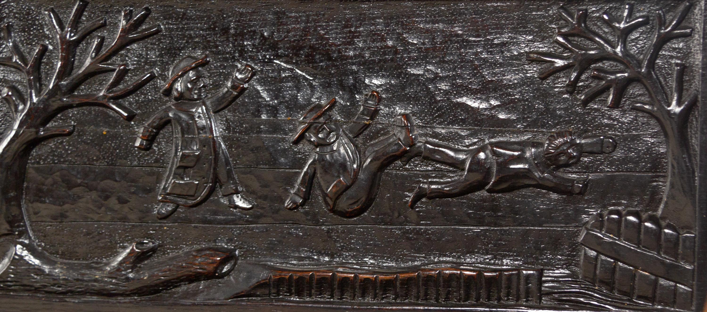 A William and Mary Style Carved Oak Settle