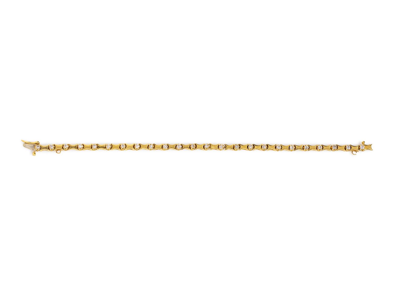 A 14 Karat Yellow Gold and Diamond Bracelet,