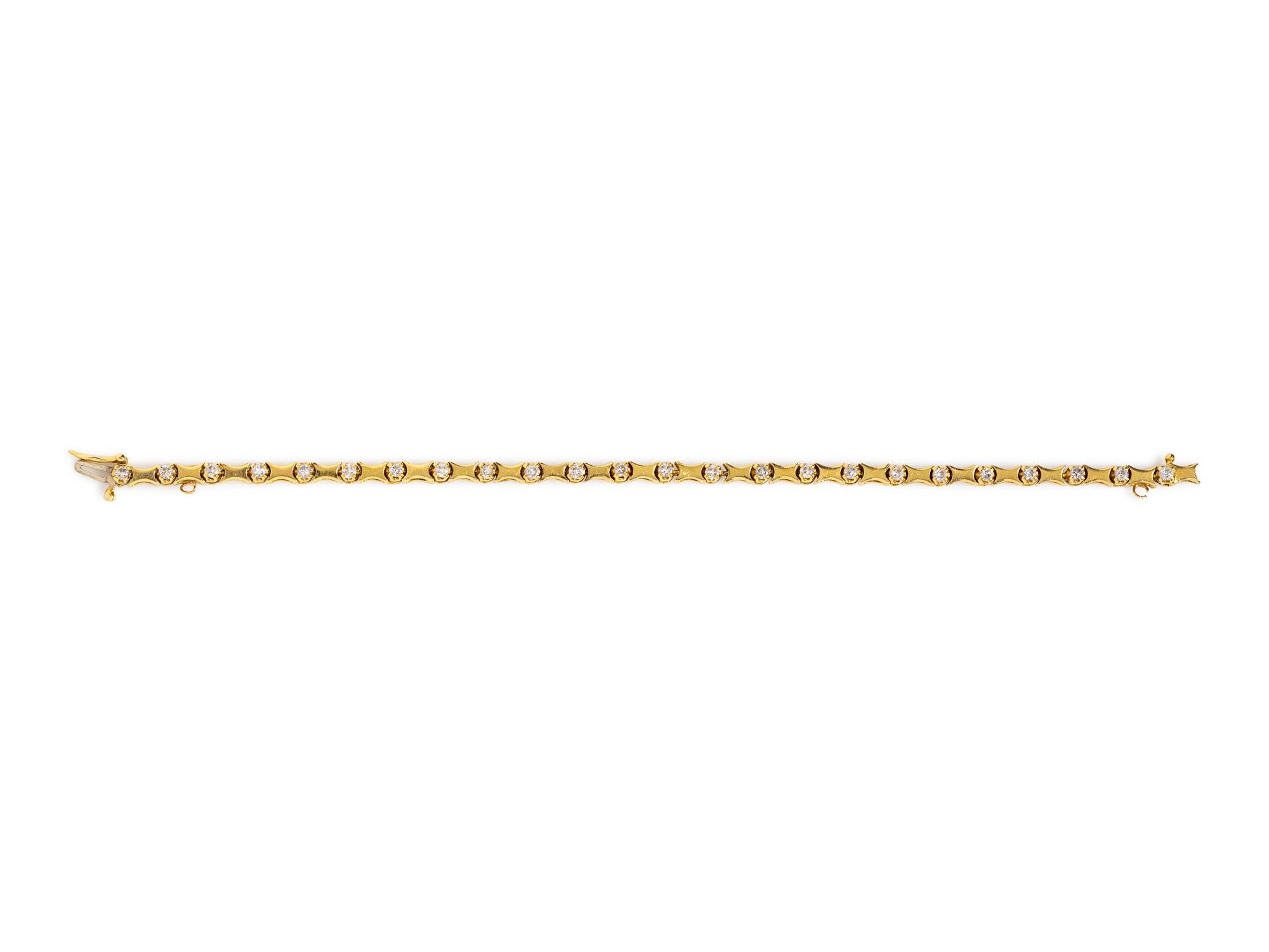 A 14 Karat Yellow Gold and Diamond Bracelet,