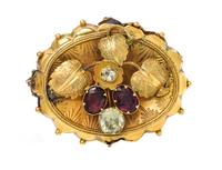 VICTORIAN, GARNET AND HARDSTONE PENDANT/BROOCH, CIRCA 1879,