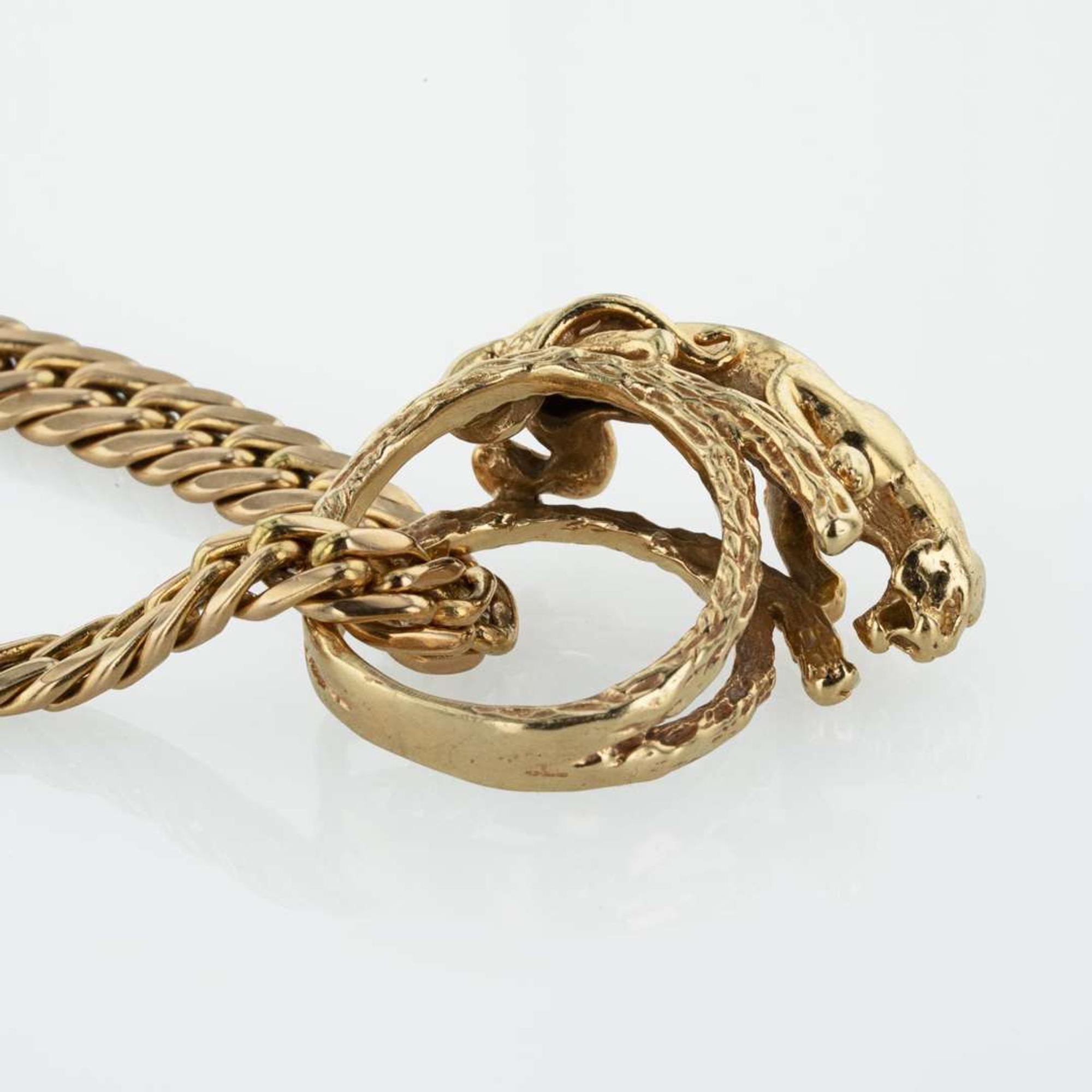 A 14K Yellow Gold Necklace and Panther Ring