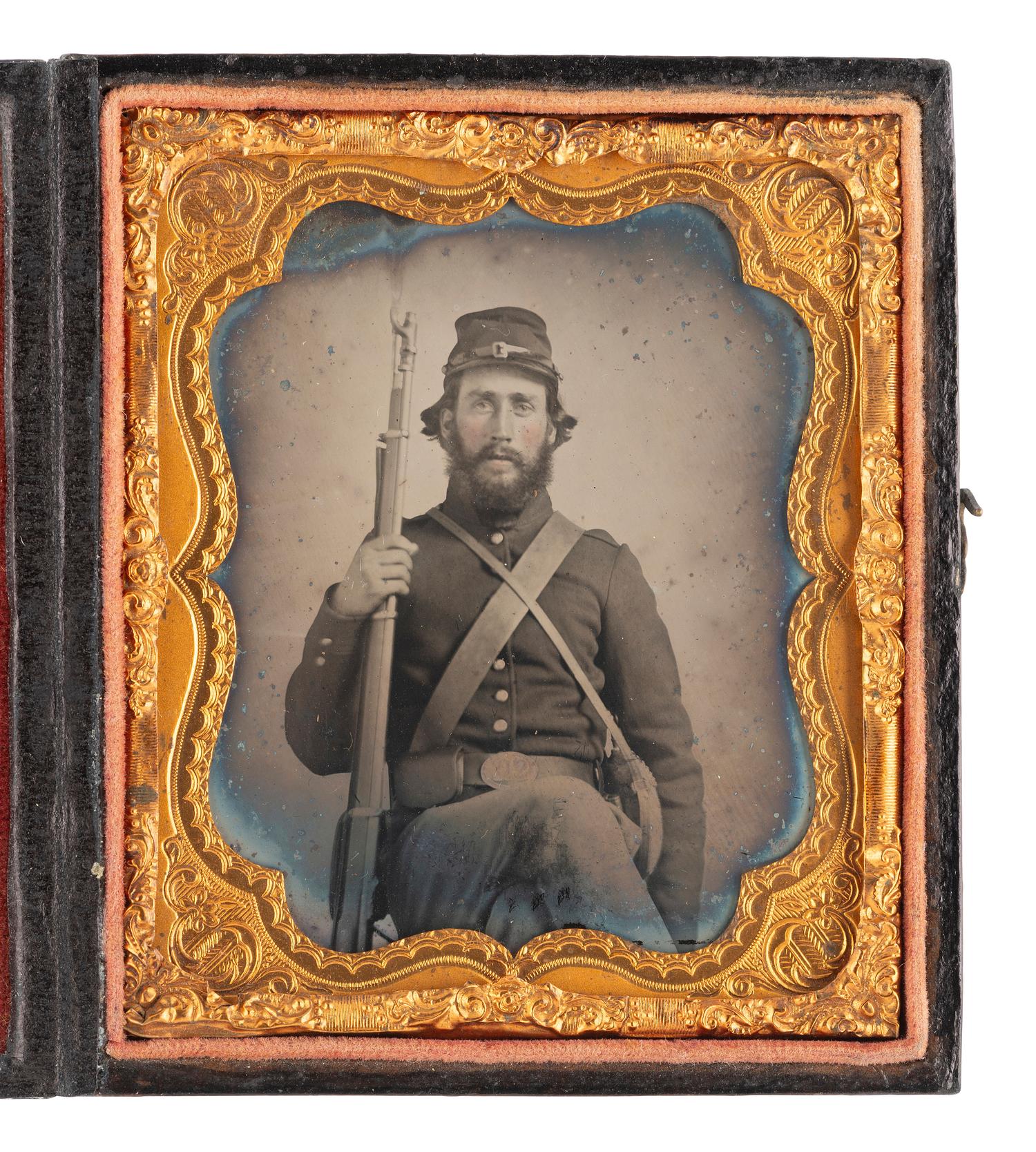 [CIVIL WAR] Sixth plate ruby ambrotype of a soldier with an Enfield rifle musket, possibly from IL.