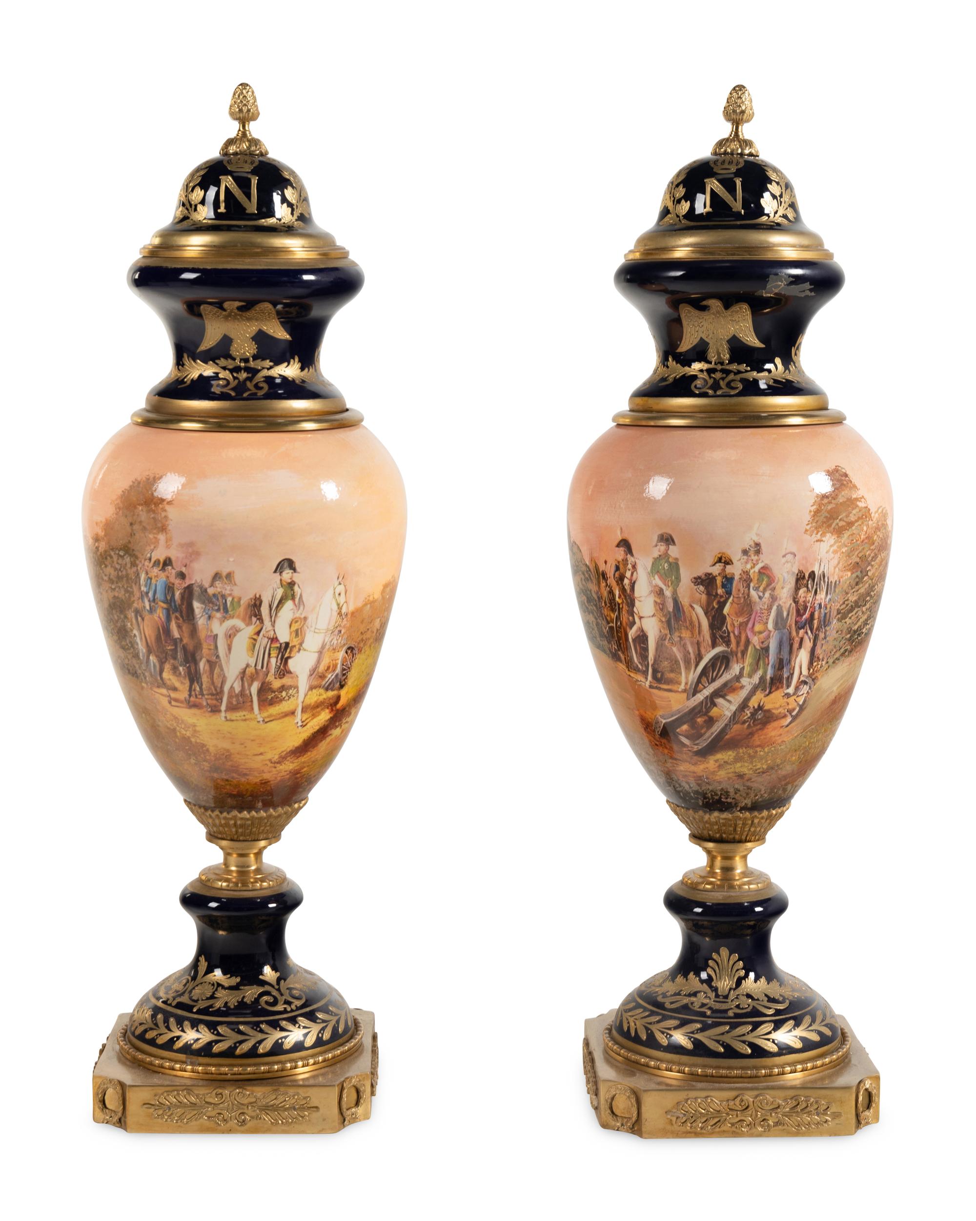 A Pair of Gilt Bronze Mounted Sèvres Style Porcelain Urns