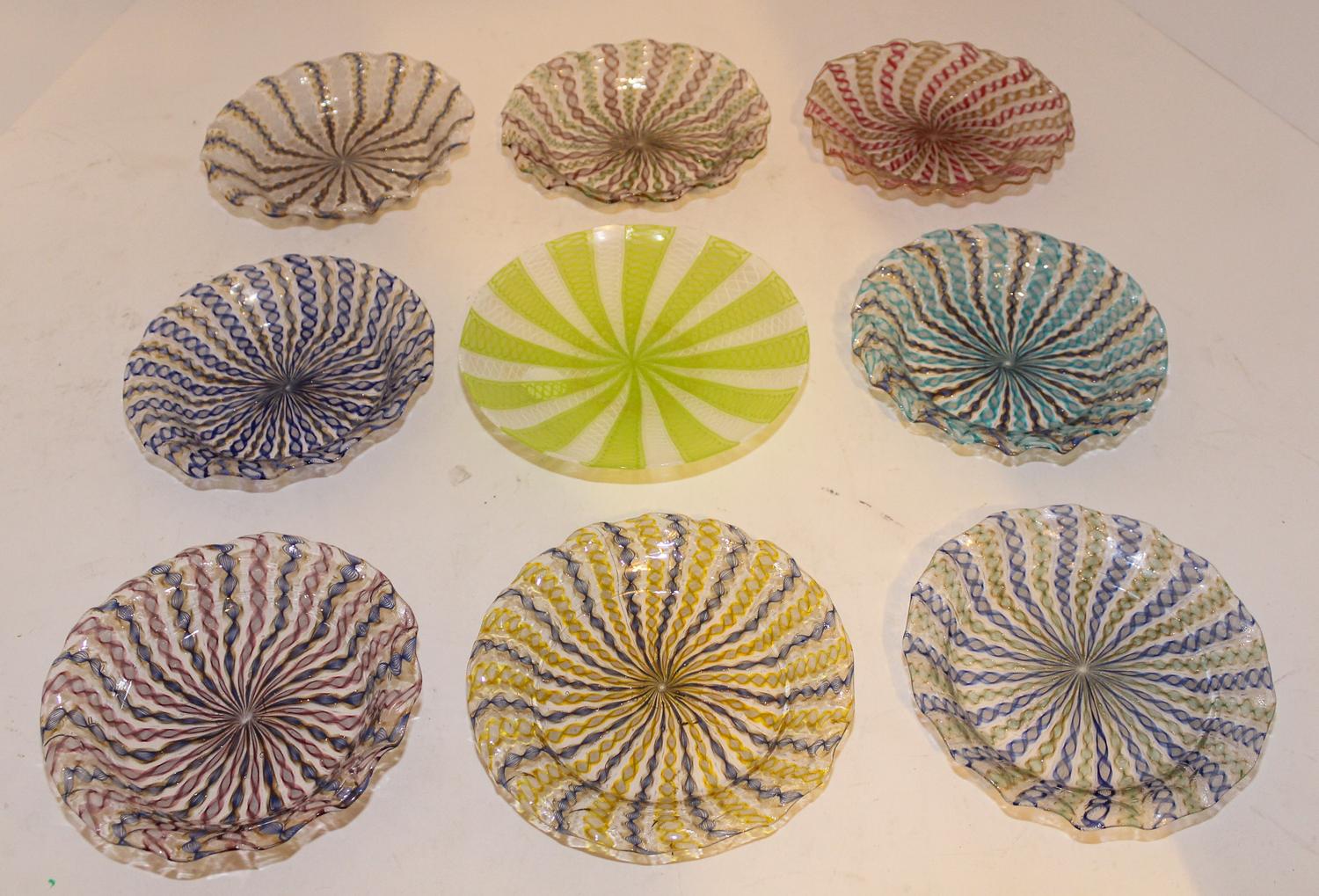 A Set of Eight Venetian Glass Dishes Diameter 7 inches.