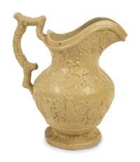 A Collection of Seven English Salt Glazed Relief Form Pitchers — 19TH/20TH CENTURY