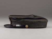 [CIVIL WAR]. Kepi and sash identified to Surgeon Hermann Ideler, 45th New York Infantry and 15th New York Heavy Artillery.