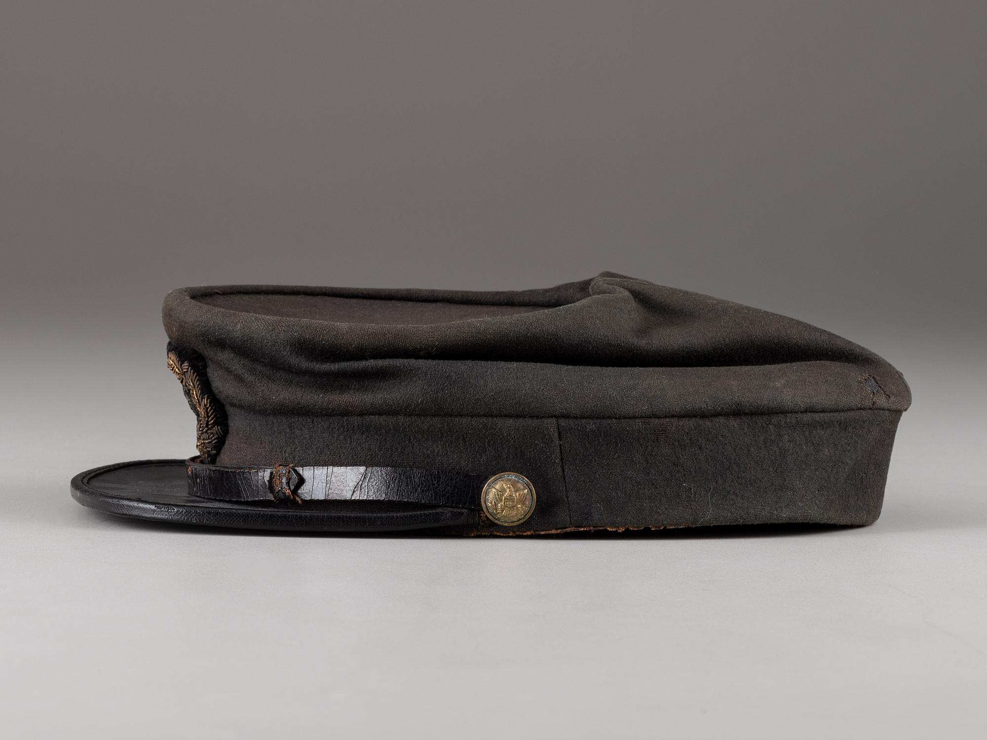[CIVIL WAR]. Kepi and sash identified to Surgeon Hermann Ideler, 45th New York Infantry and 15th New York Heavy Artillery.
