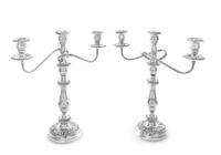 A Pair of American Silver Three-Light Candelabra, S. Kirk & Son, Baltimore, MD, the central urn form candle cup having a repousse flora