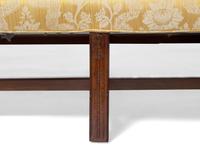 A Chippendale Mahogany Eight-Leg Camelback Sofa