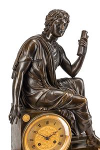 A Louis Philippe Bronze and Marble Figural Clock