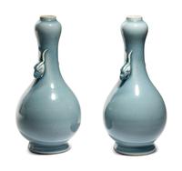 A Pair of Clair-de-Lune Glazed Porcelain 'Garlic Head' Bottle Vases