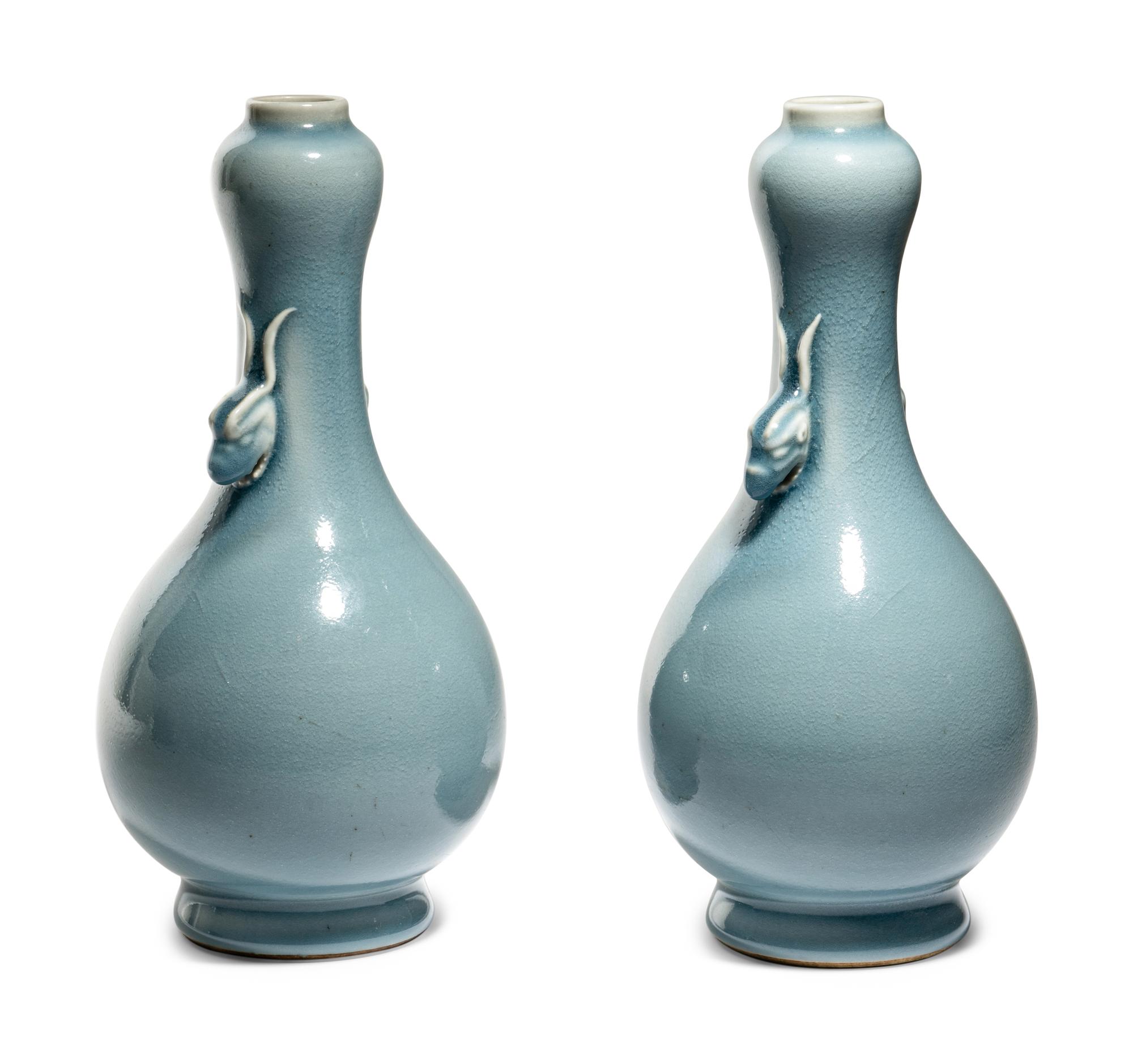 A Pair of Clair-de-Lune Glazed Porcelain 'Garlic Head' Bottle Vases