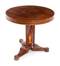 A Charles X Line Inlaid Rosewood Center Table with Marquetry Depicting Suits of Armor