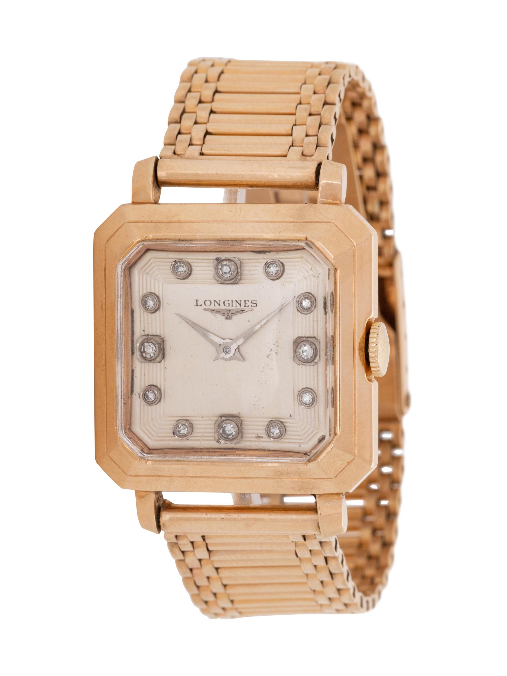 A 14 Karat Yellow Gold and Diamond Wristwatch, Longines, Circa 1940's,