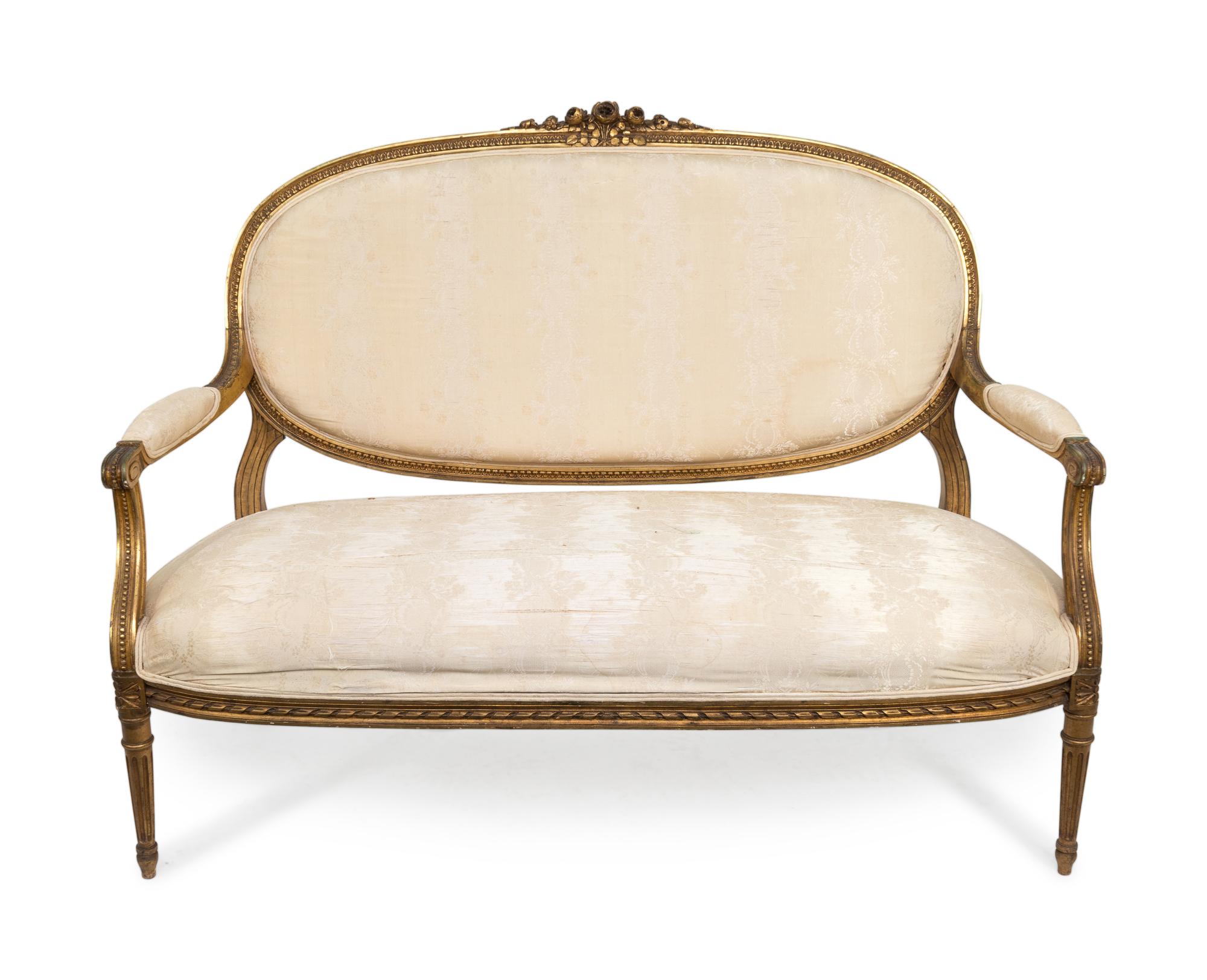 A Five-Piece Louis XVI Style Carved Giltwood Parlour Suite — 19TH CENTURY