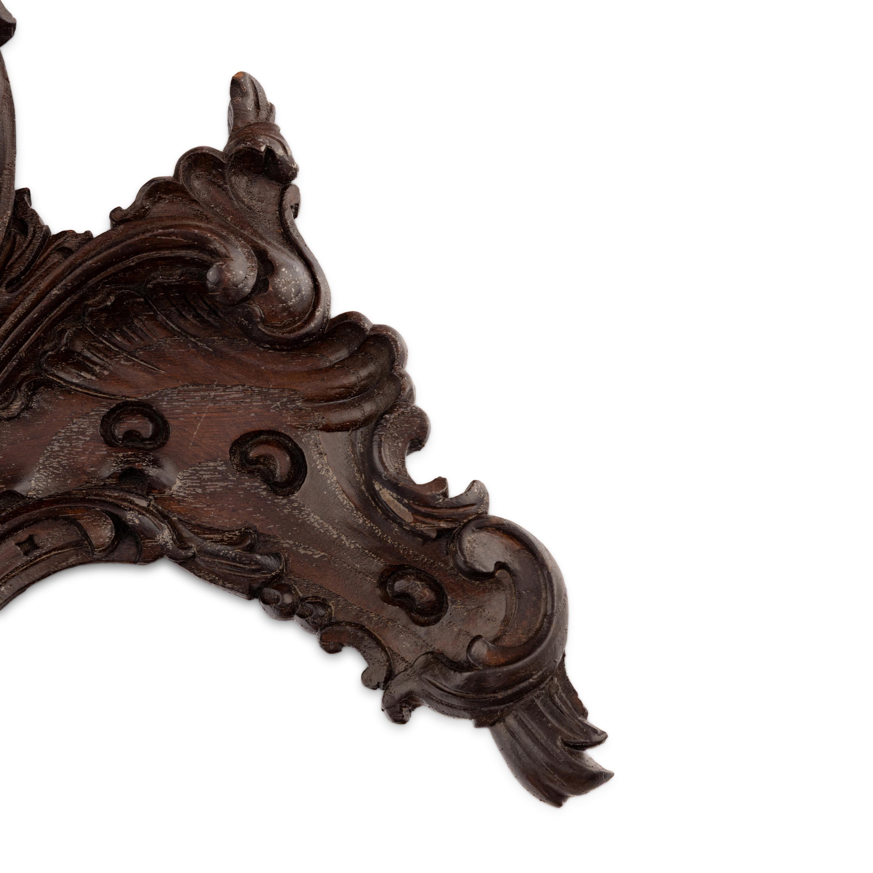A Continental Carved Oak Furniture Crest