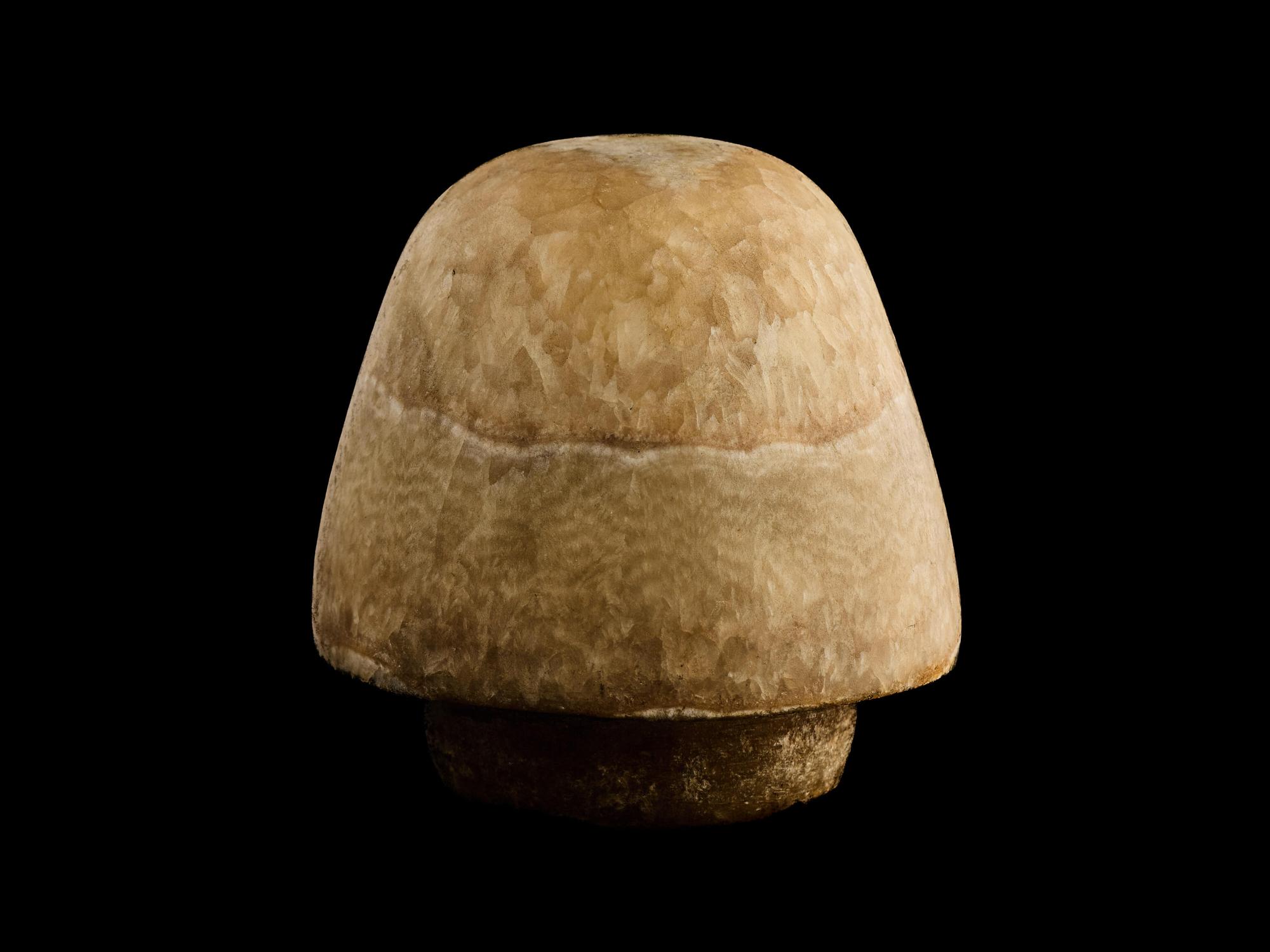 An Egyptian Alabaster Canopic Jar Lid