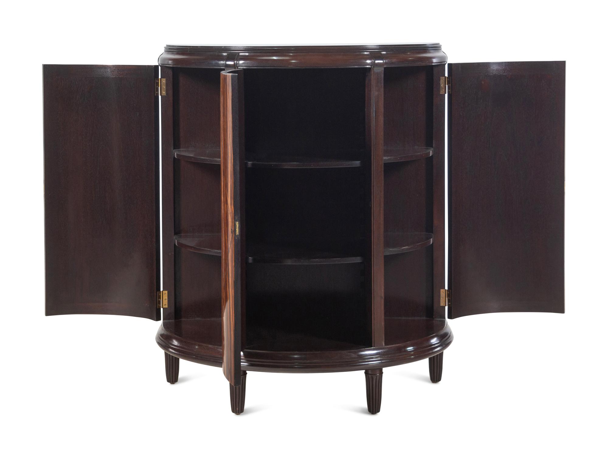 A Pair of Dessin Fournir Walnut and Banded Rosewood Demilune Cabinets