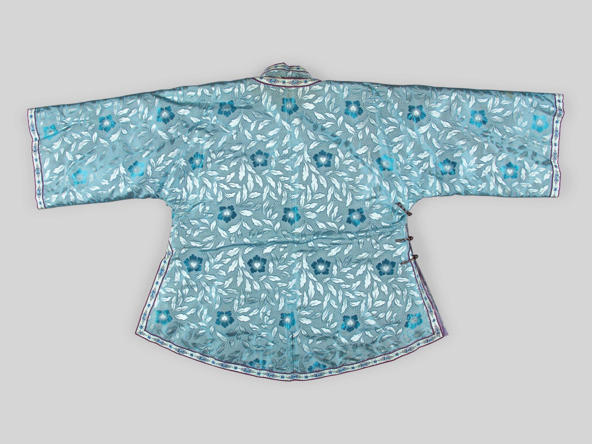 A Fur Lined Light Blue Silk Ladie's Jacket