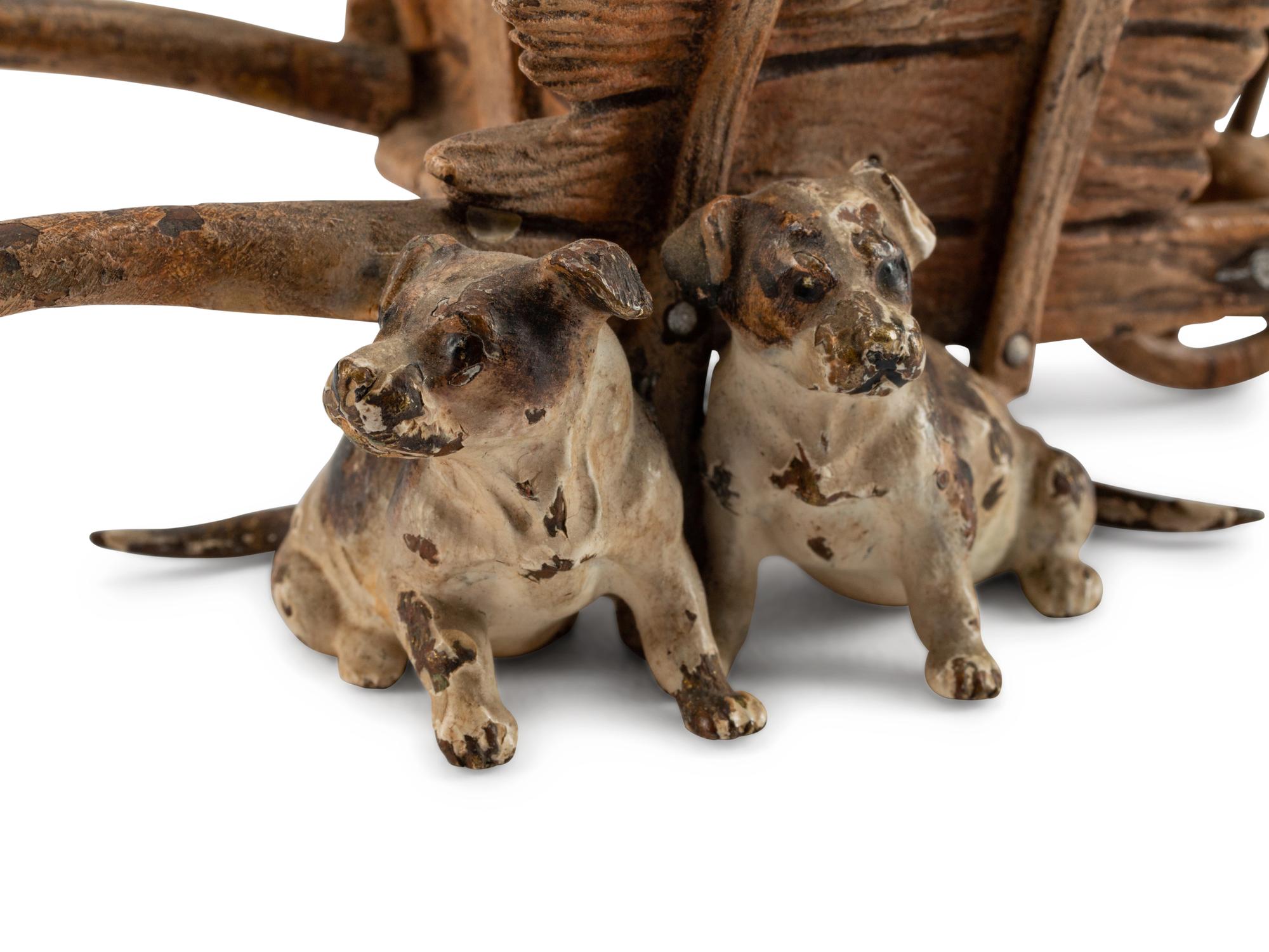 An Austrian Cold-Painted Group of Dogs and a Wheelbarrow — EARLY 20TH CENTURY