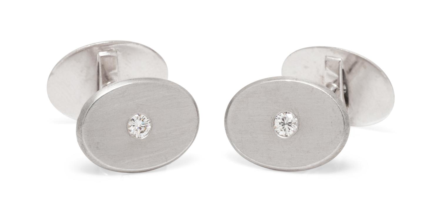 A Pair of Platinum and Diamond Cufflinks,