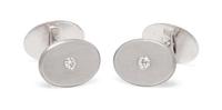 A Pair of Platinum and Diamond Cufflinks,